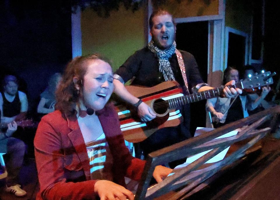 From left, Shannon Davis and John Connelly play two musicians who meet in Dublin and fall in love in the musical "Once" at the Academy Playhouse in Orleans.