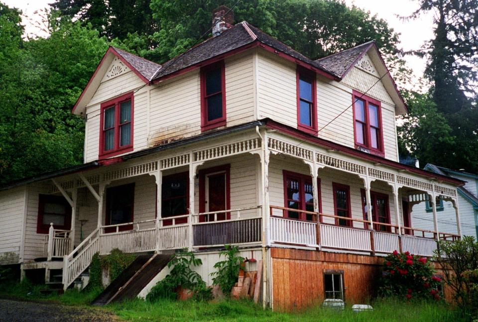 FILE - The house featured in the Steven Spielberg film "The Goonies" is viewed in Astoria, Ore., May 24, 2001. A man who was saved by a Coast Guard rescue swimmer at the mouth of the Columbia River on Friday, Feb. 3, 2023, as a massive wave overturned the yacht he was piloting turned out to be wanted by police for a bizarre incident in which he allegedly left a dead fish at the Astoria home. AP Photo/Stepanie Firth, File)