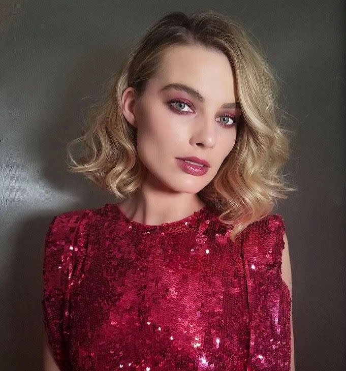 <p>Where do we start? The matchy matchy burnt red lipstick and eyeshadow. The major sequin dress. And that hair. Yup, Margot Robbie slayed us with yet another epic hair look, rocking side swept, effortlessly undone curls that might just be the cool girl glam lob of our dreams. Correction: it definitely is. </p><p>Styled by celeb hairstylist and the man behind Robbie's next level hair game recently, Bryce Scarlett, Robbie's romantic twist on classic Hollywood waves gave the whole look an 80s disco twist that we are seriously feeling. </p><p>If there was ever a reason to stay strong to last year's obsession with the lob, it's this 'do. Obsessed.</p>