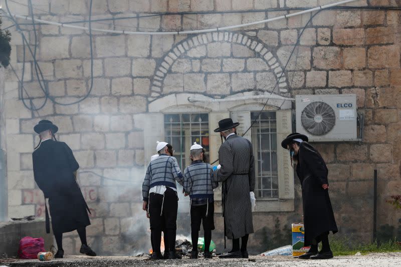 Ultra-Orthodox Jews burn leaven in the Mea Shearim neighbourhood of Jerusalem ahead of the Jewish holiday of Passover