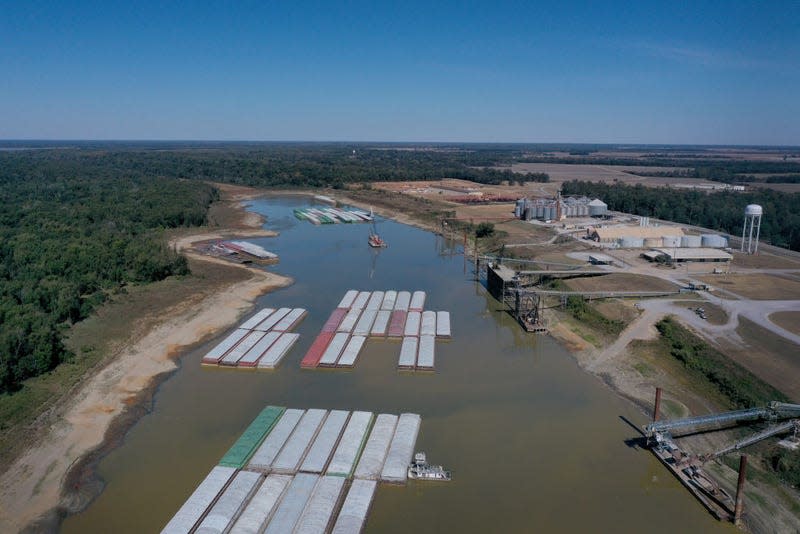 In this aerial view, barges, stranded by low water sit at the Port of Rosedale along the Mississippi River on October 20, 2022 in Rosedale, Mississippi.