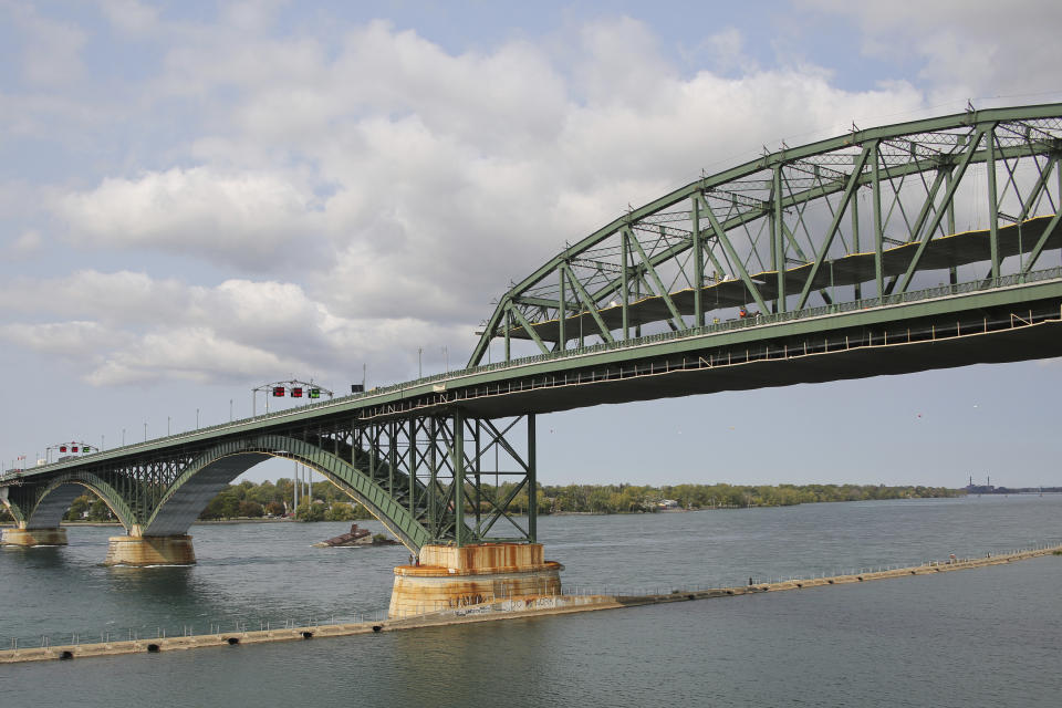 This photo shows a general view of the Peace Bridge, Tuesday, Sept. 22, 2020, in Buffalo N.Y. Pascale Ferrier, a Canadian woman accused of mailing a package containing the poison ricin to the White House, was taken into custody Sunday, Sept. 20 by U.S. Customs and Border Protection officers at the Peace Bridge border crossing near Buffalo and is expected to face federal charges Tuesday in Buffalo, New York. (AP Photo/Jeffrey T. Barnes)