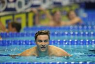 Bobby Finke reacts after winning the men's 1500 freestyle during wave 2 of the U.S. Olympic Swim Trials on Sunday, June 20, 2021, in Omaha, Neb. (AP Photo/Jeff Roberson)