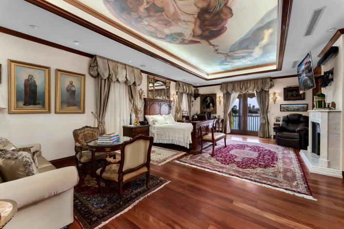 a room with many paintings in the most expensive home currently for sale in Florida, 18 La Gorce Circle in Miami Beach