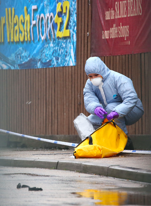 <em>Forensic teams are gathering evidence following the shooting (PA)</em>
