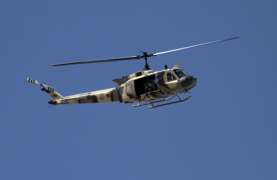 <p>Afghanistan’s military helicopter flies over the site of a suicide attack in Kabul, Afghanistan, Wednesday, May 31, 2017. (AP Photos/Massoud Hossaini) </p>