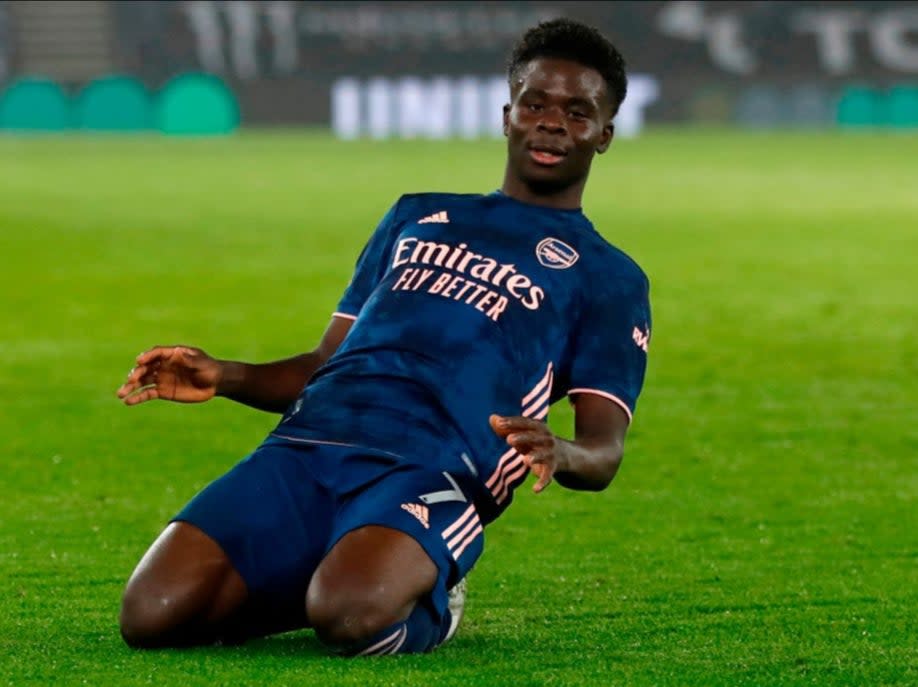 Bukayo Saka celebrates scoring Arsenal’s secondPOOL/AFP via Getty Images