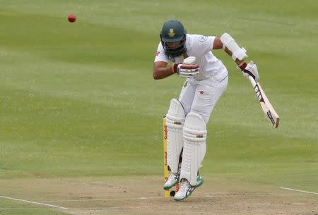 Cricket - Sri Lanka v South Africa - Second Test cricket match - Newlands Stadium, Cape Town, South Africa - 02/01/2017. South Africa's Hashim Amla takes evasive action. REUTERS/Mike Hutchings