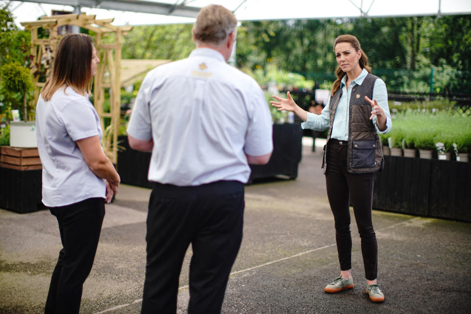 FAKENHAM, ENGLAND - JUNE 18: Catherine, Duchess of Cambridge talks to Martin and Jennie Turner, owners of the Fakenham Garden Centre in Norfolk, during her first public engagement since lockdown, on June 18, 2020 in Fakenham, United Kingdom. The garden centre is near her Anmer Hall home and, as a keen gardener, the Duchess wanted to hear how the Covid-19 pandemic had affected the family-run independent business, which first opened in 1984. (Photo by Aaron Chown - WPA Pool/Getty Images)