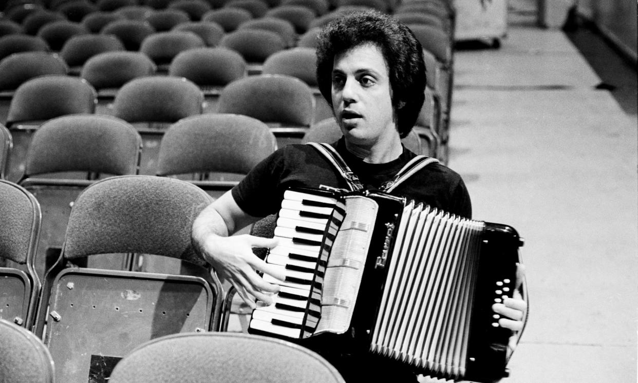 <span>Billy Joel in New York on 7 December 1977. </span><span>Photograph: Michael Putland/Getty Images</span>