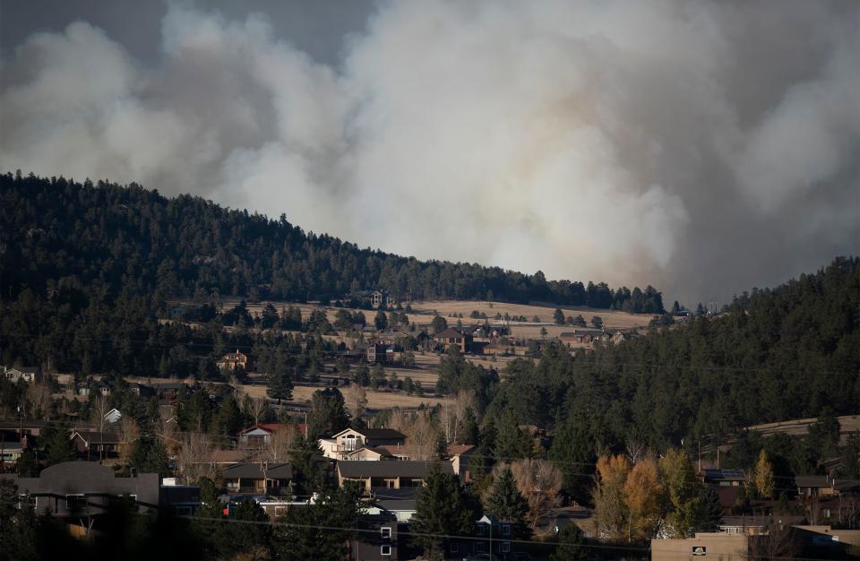 Smoke from the Cameron Peak Fire fills the sky outside Estes Park, Colo. on Friday, Oct. 16, 2020.