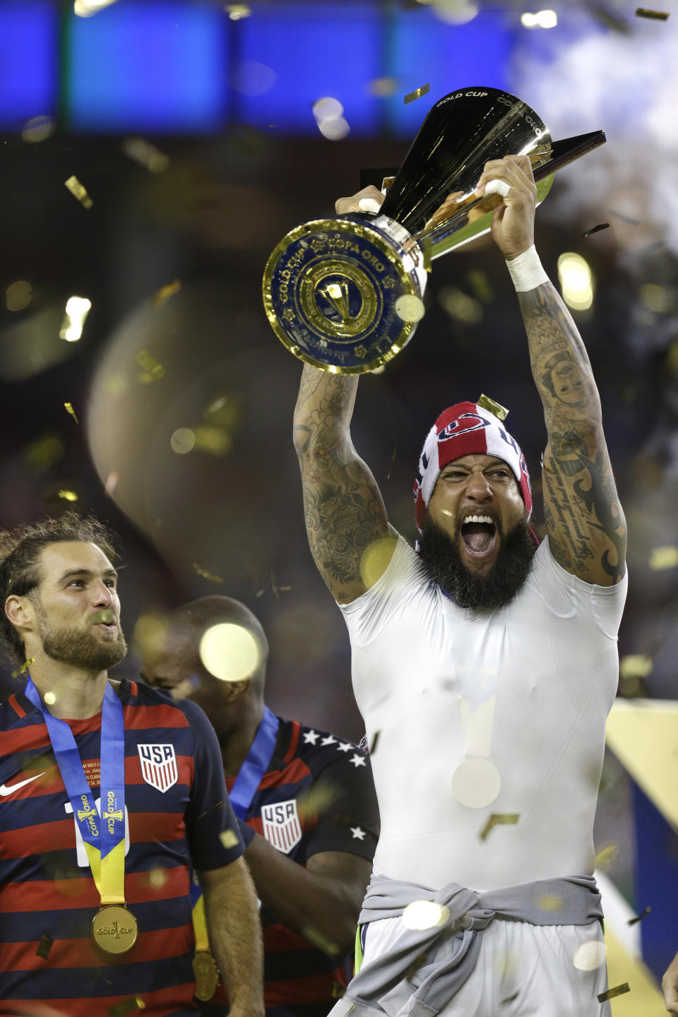 FILE - United States' Tim Howard raises the championship trophy after the United States beat Jamaica 2-1 in the Gold Cup final soccer match in Santa Clara, Calif., July 26, 2017. Howard was elected to the U.S. National Soccer Hall of Fame on Saturday, Dec. 2, 2023, and will be inducted on May 4, 2024. (AP Photo/Ben Margot, File)