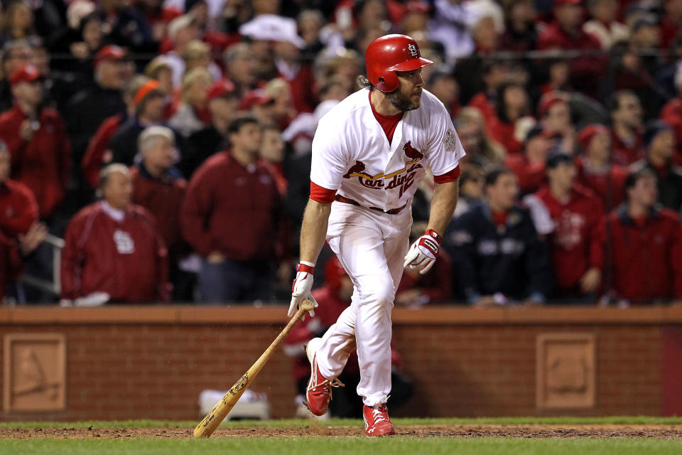 ST LOUIS, MO - OCTOBER 27: Lance Berkman #12 of the St. Louis Cardinals hits a game-tying RBI single to score Jon Jay #19 in the 10th inning during Game Six of the MLB World Series against the Texas Rangers at Busch Stadium on October 27, 2011 in St Louis, Missouri. (Photo by Jamie Squire/Getty Images)