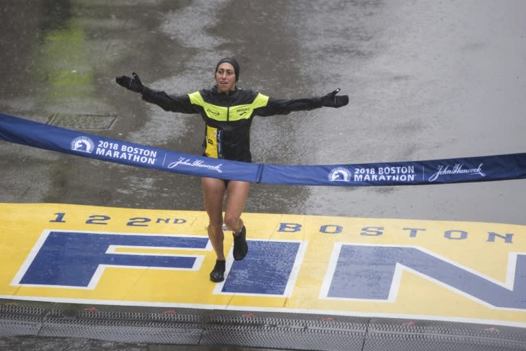 Desiree Linden of the United States crosses the finish line as the winner of the 122nd Boston Marathon