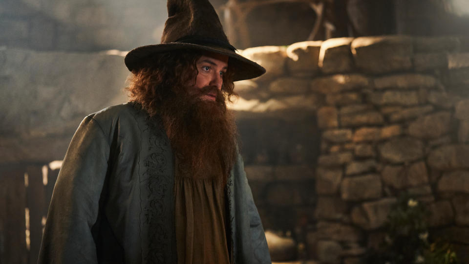 Tom Bombadil (Rory Kinnear) in his robe and pointy hat in 