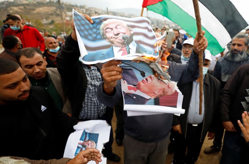 Palestinians protest against Jewish settlements and U.S. President Donald Trump