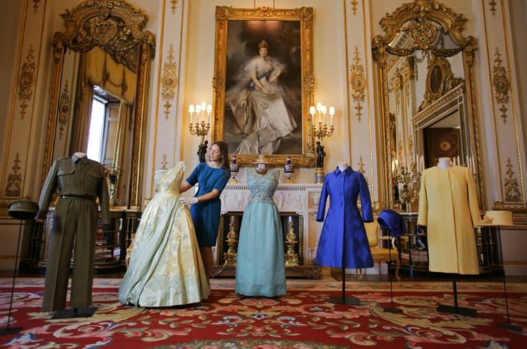 Caroline de Guitaut, Senior Curator at The Royal Collection, poses for a picture in the White Drawing Room during the exhibition preview for "Fashioning a Reign: 90 Years of Style from The Queen's Wardrobe" at Buckingham Palace in London