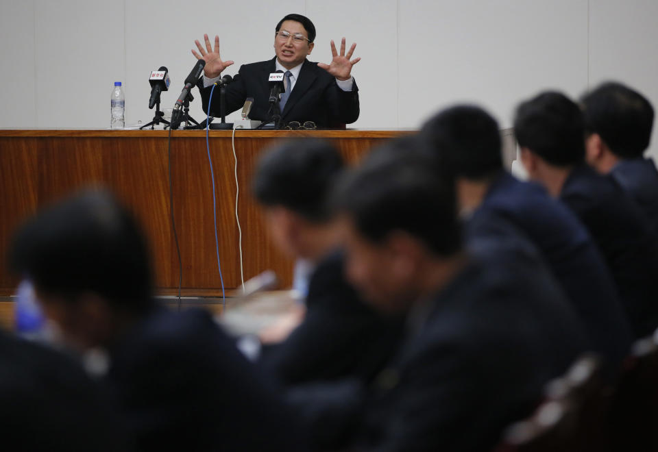 Kim Jung Wook, a South Korean Baptist missionary, gestures during a news conference in Pyongyang, North Korea, Thursday, Feb. 27, 2014. Kim who was arrested more than four months ago for allegedly trying to establish underground Christian churches in North Korea told reporters Thursday he is sorry for his ``anti-state’’ crimes and appealed to North Korean authorities to show him mercy by releasing him from their custody. (AP Photo/Vincent Yu)