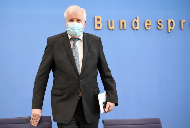 German Interior Minister Horst Seehofer attends a news conference, in Berlin