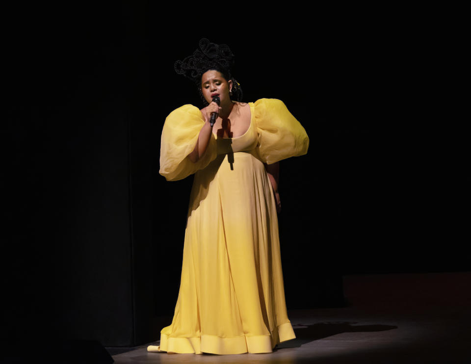 Lido Pimienta in “Sky to Hold” (world premiere). Choreography by Andrea Miller; music by Lido Pimienta, (commissioned by New York City Ballet); costumes by Esteban Cortázar; costumes supervised by Marc Happel; lighting by Nicole Pierce. New York City Ballet, Fashion Gala, Sept.30, 2021, David H. Koch Theater, Lincoln Center. Credit Photo: Erin Baiano