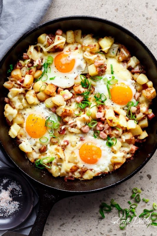 <p>A cheesy bacon and egg hash for a delicious brunch! Easy to make and ready in 30 minutes!</p><p><a href="https://cafedelites.com/2016/05/26/cheesy-bacon-and-egg-hash/" rel="nofollow noopener" target="_blank" data-ylk="slk:Get the recipe here!;elm:context_link;itc:0;sec:content-canvas" class="link rapid-noclick-resp"><em><strong>Get the recipe here!</strong></em></a></p>