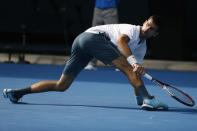 Serbia's Novak Djokovic reacts during his Men's singles second round match against Uzbekistan's Denis Istomin. REUTERS/Issei Kato