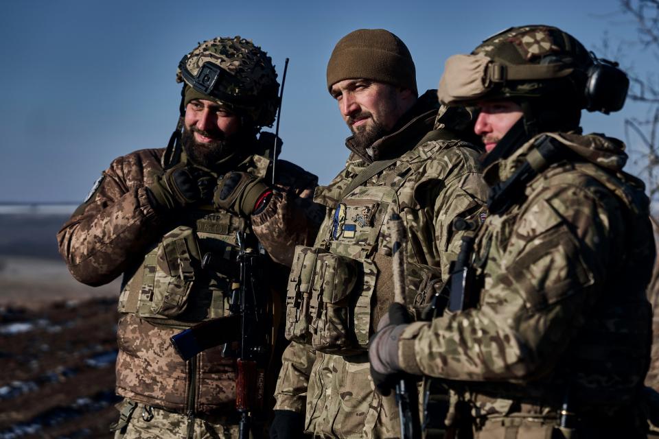 Ukrainian soldiers look on in the frontline close to Bakhmut, Donetsk region, Ukraine, Wednesday, Feb. 8, 2023.