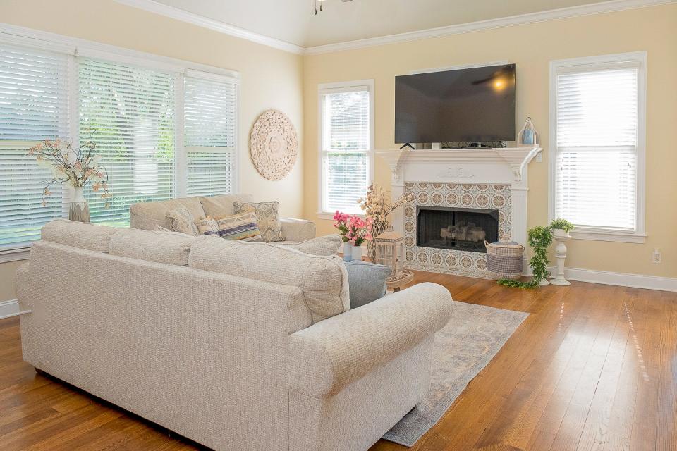 The family room is bright and beautiful and sits next to the kitchen.