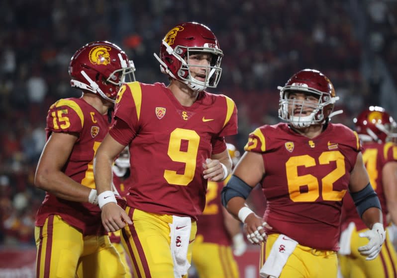 LOS ANGELES, CA - SEPTEMBER 25, 2021: USC Trojans quarterback Kedon Slovis (9) runs off the field.