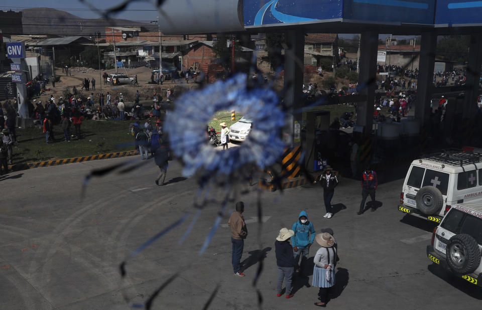 A window is marred by a bullet hole made by security forces when they fired on backers of of former President Evo Morales the day before, in Sacaba, Bolivia, Saturday, Nov. 16, 2019. Officials said Saturday that at least eight people died and dozens were injured in Sacaba, an incident that threatens the interim government’s efforts to restore stability following the resignation of the former president in an election dispute. (AP Photo/Juan Karita)