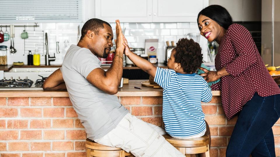 family spending time together high five.