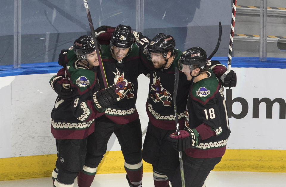 The Arizona Coyotes celebrate a goal against the Nashville Predators during third period NHL qualifying round game action in Edmonton on Wednesday, Aug. 5, 2020. (Jason Franson/The Canadian Press via AP)