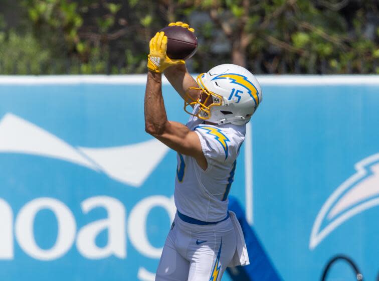 Chargers rookie wide receiver Ladd McConkey catches a pass during practice.