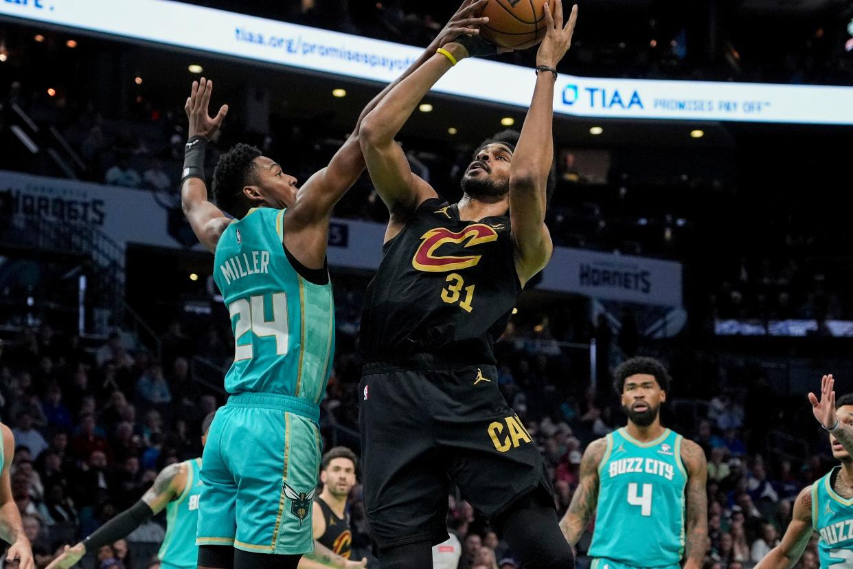 Mar 27, 2024; Charlotte, North Carolina, USA; Cleveland Cavaliers center Jarrett Allen (31) goes up for a shot against Charlotte Hornets forward Brandon Miller (24) during the first quarter at Spectrum Center. Mandatory Credit: Jim Dedmon-USA TODAY Sports