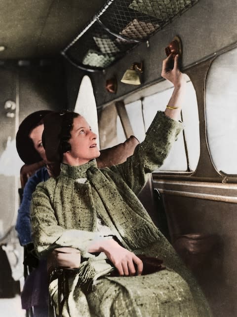 A colourised image, courtesy of AirlineRatings.com, shows the cabin of a DH86