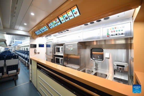 Interior photos showed the passenger layout and dining car. Credit: Xinhua via Sasac.gov.cn