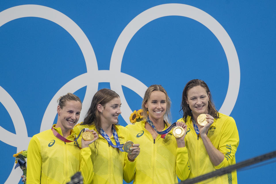 The Australian team of Bronte Campbell, Meg Harris, Emma McKeon and Cate Campbell, on the podium with their gold medals after the 4 x 100m Freestyle Relay for women during the Swimming Finals at the Tokyo Aquatic Centre at the Tokyo 2020 Summer Olympic Games on July 25, 2021 in Tokyo, Japan. 