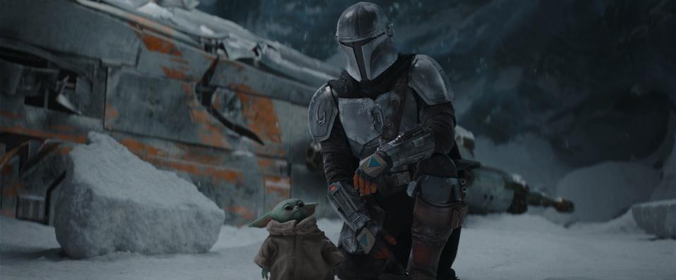 The Mandalorian (Pedro Pascal) and the Child in "The Mandalorian" Season 2.