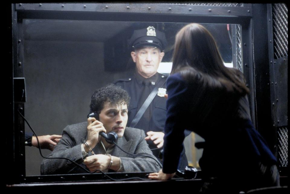 A distressed man in jail attempts to convince his ex-wife that something sinister is happening in “Dark City”