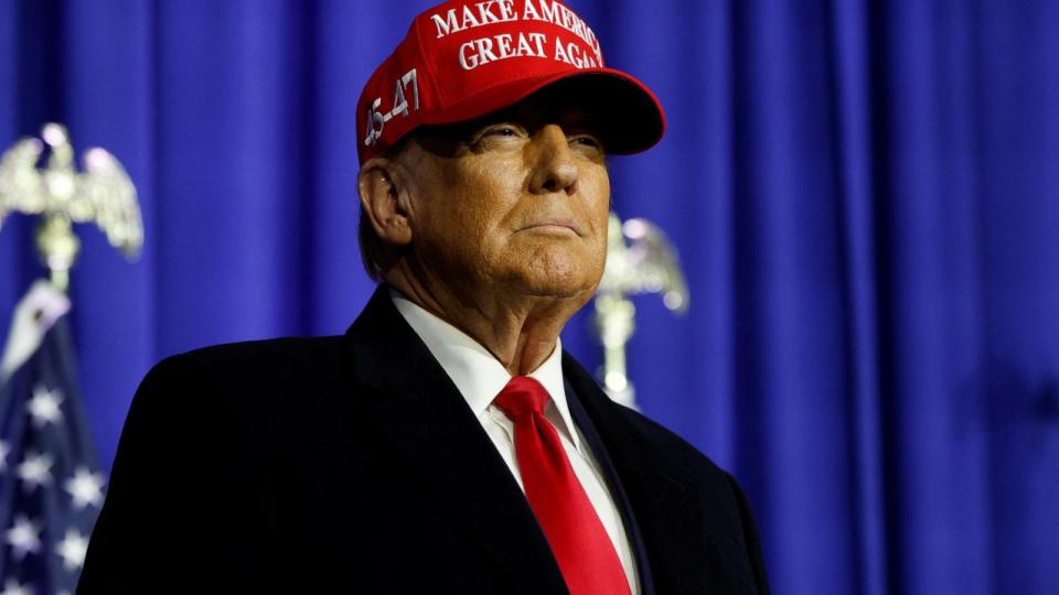 PHOTO: Former U.S. President Donald Trump looks on at a campaign event in Waterford Township, Michigan (Rebecca Cook/Reuters)