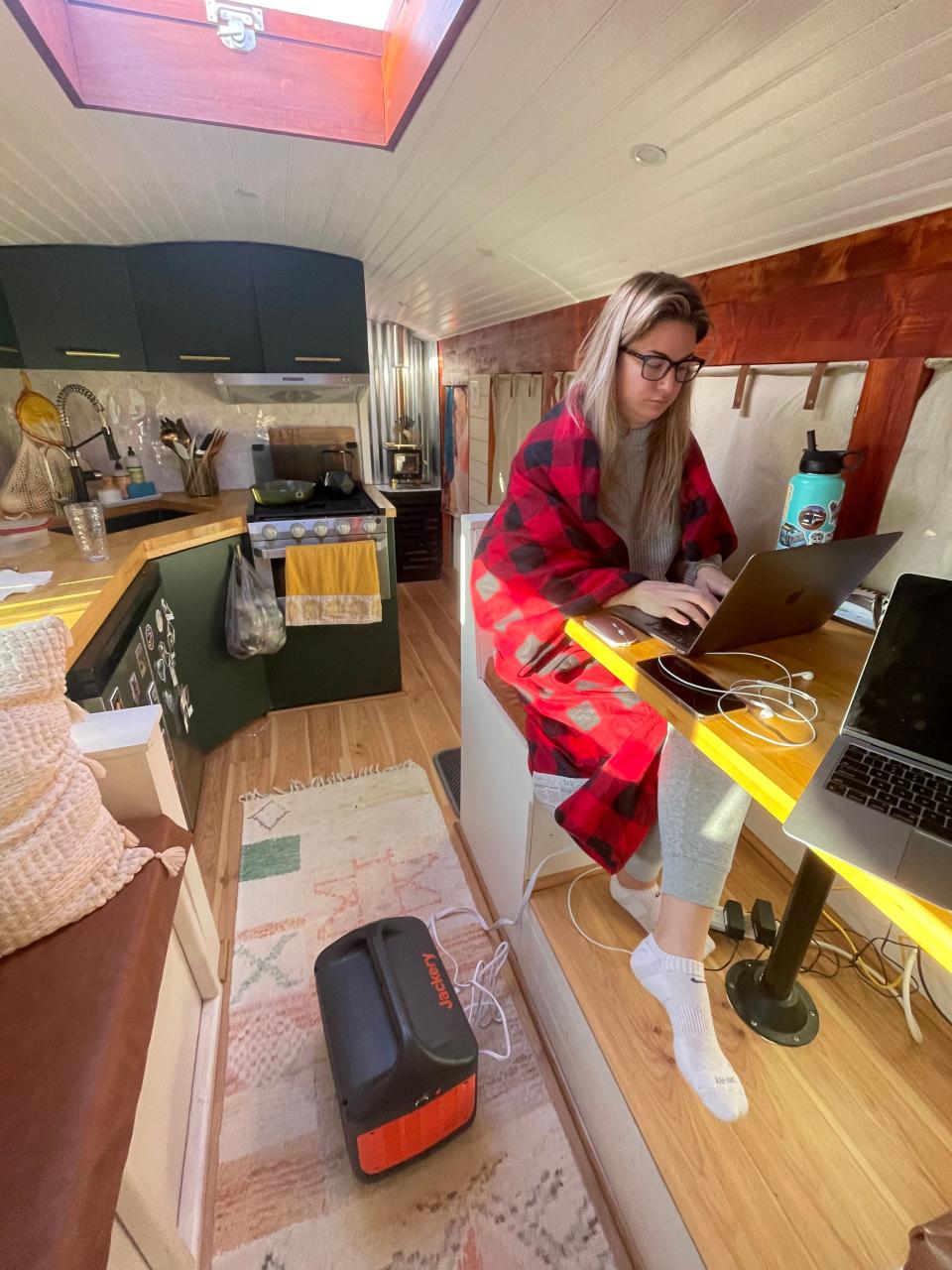 nicole jones working from the inside of her van