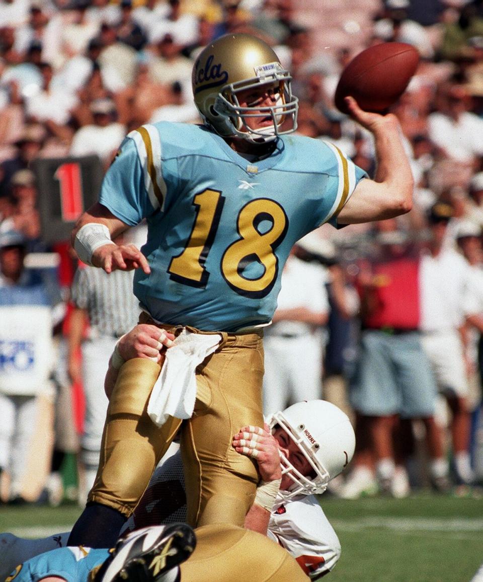 UCLA's Cade McNown throws a pass against Texas in September 1998.