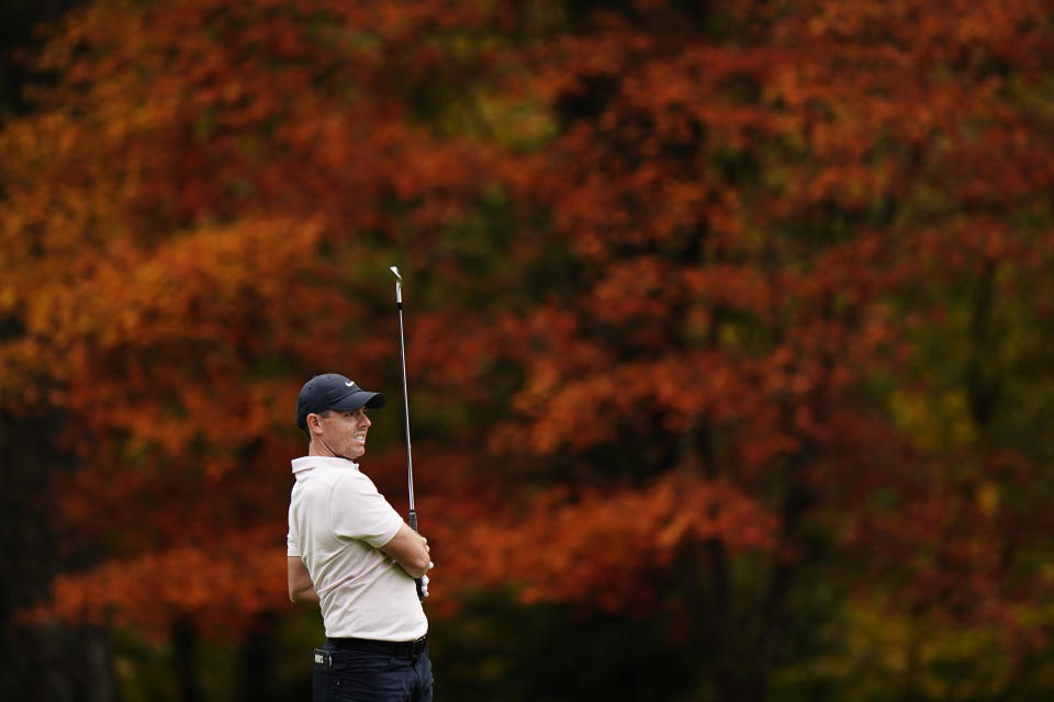 Rory McIlroy, of Northern Ireland, watches his shot on the 11th hole during a practice round for the Masters golf tournament Tuesday, Nov. 10, 2020, in Augusta, Ga. (AP Photo/Matt Slocum)