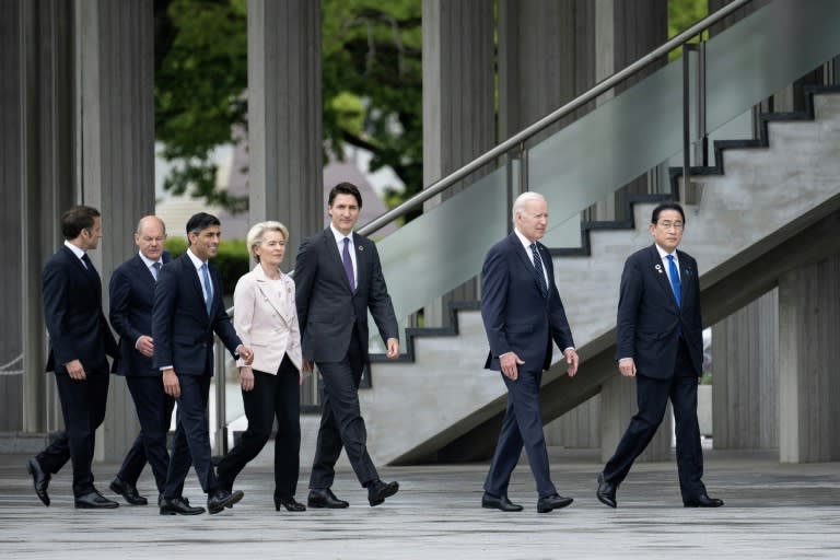 (L to R) The leaders of France, Germany, the United Kingdom, the European Commission, Canada, the United States and Japan visit the Peace Park in the Japanese city of Hiroshima on May 19, 2023