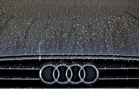 FILE PHOTO: Front of an A6 TDI diesel model of German car manufacturer Audi is pictured at a car wash in Hanau