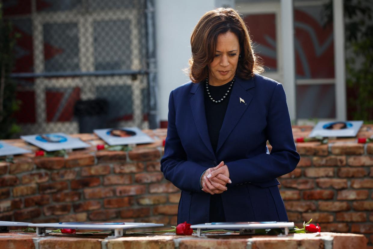 Vice President Kamala Harris pays her respects to the victims of the 2018 school shooting at Marjory Stoneman Douglas High School (REUTERS)
