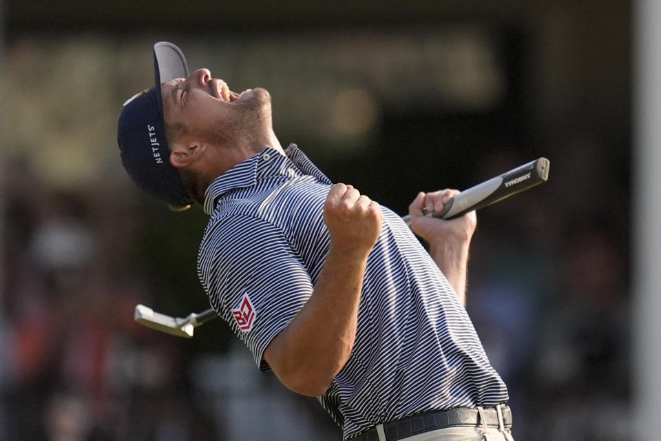 Bryson DeChambeau celebrates after winning the U.S. Open golf tournament Sunday, June 16, 2024, in Pinehurst, N.C. (AP Photo/Mike Stewart)