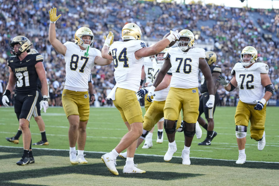 Notre Dame tight end Kevin Bauman (84) celebrates after a touchdown against Purdue during the second half of an NCAA college football game in West Lafayette, Ind., Saturday, Sept. 14, 2024. (AP Photo/Michael Conroy)