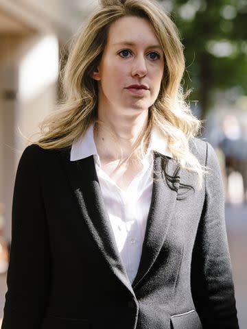 <p>Michael Short/Bloomberg/Getty </p> Elizabeth Holmes leaves federal court in San Jose on October 2, 2019.