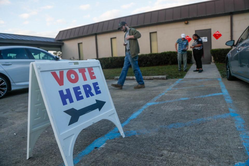 Voters exit the Progressive Recreation Center in Garden City after casting their ballots on Tuesday.